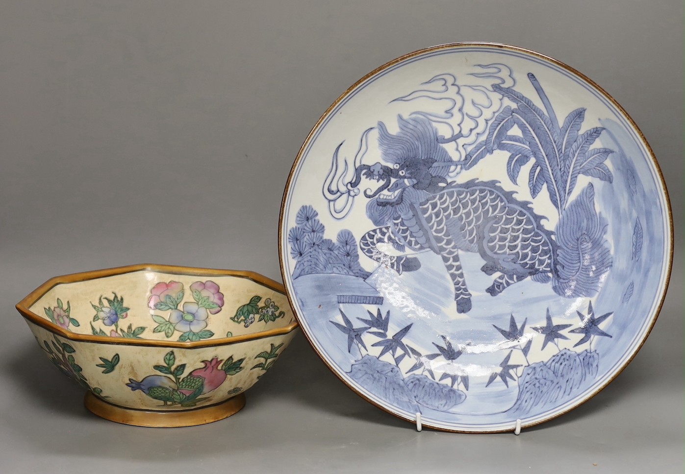 A Chinese Kangxi style blue and white ‘qilin’ dish and a famille rose octagonal dish, largest 33cm diameter